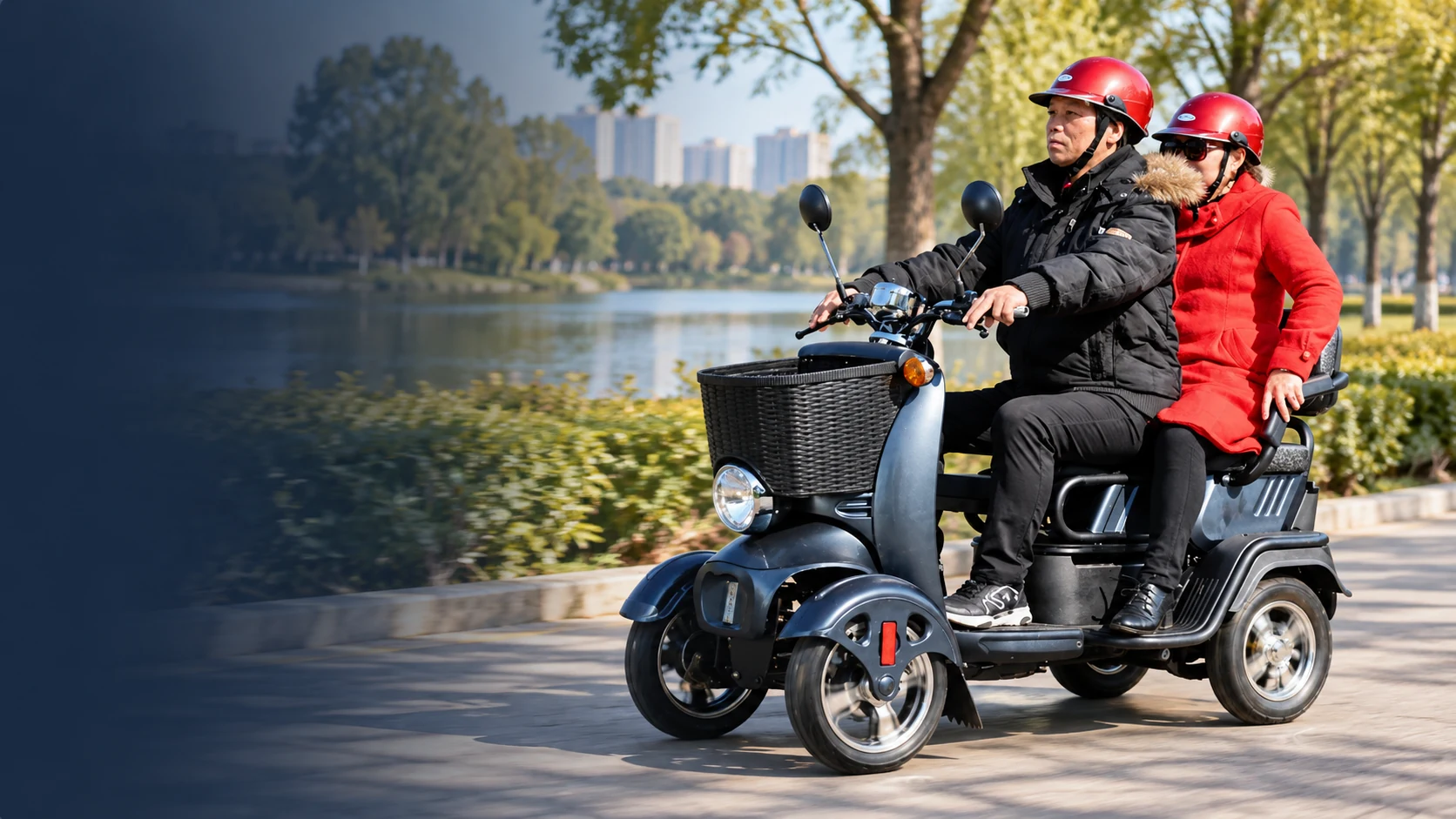 Two riders on an electric passenger tricycle beside a park